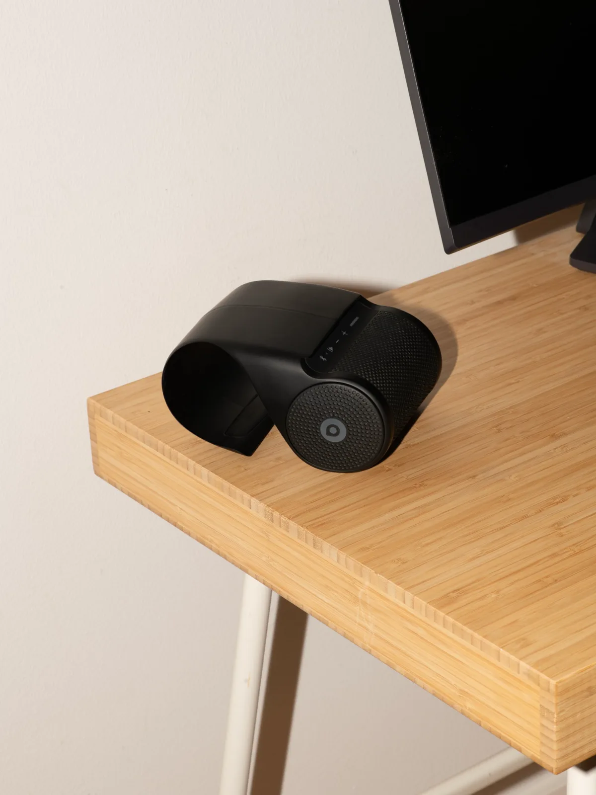 The CoAudio OneTwo opened on a desk next to a monitor